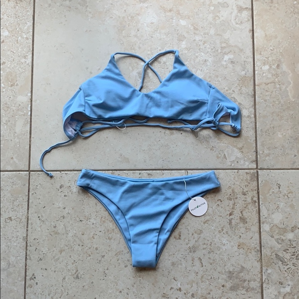 This is a blue, cross back bikini!